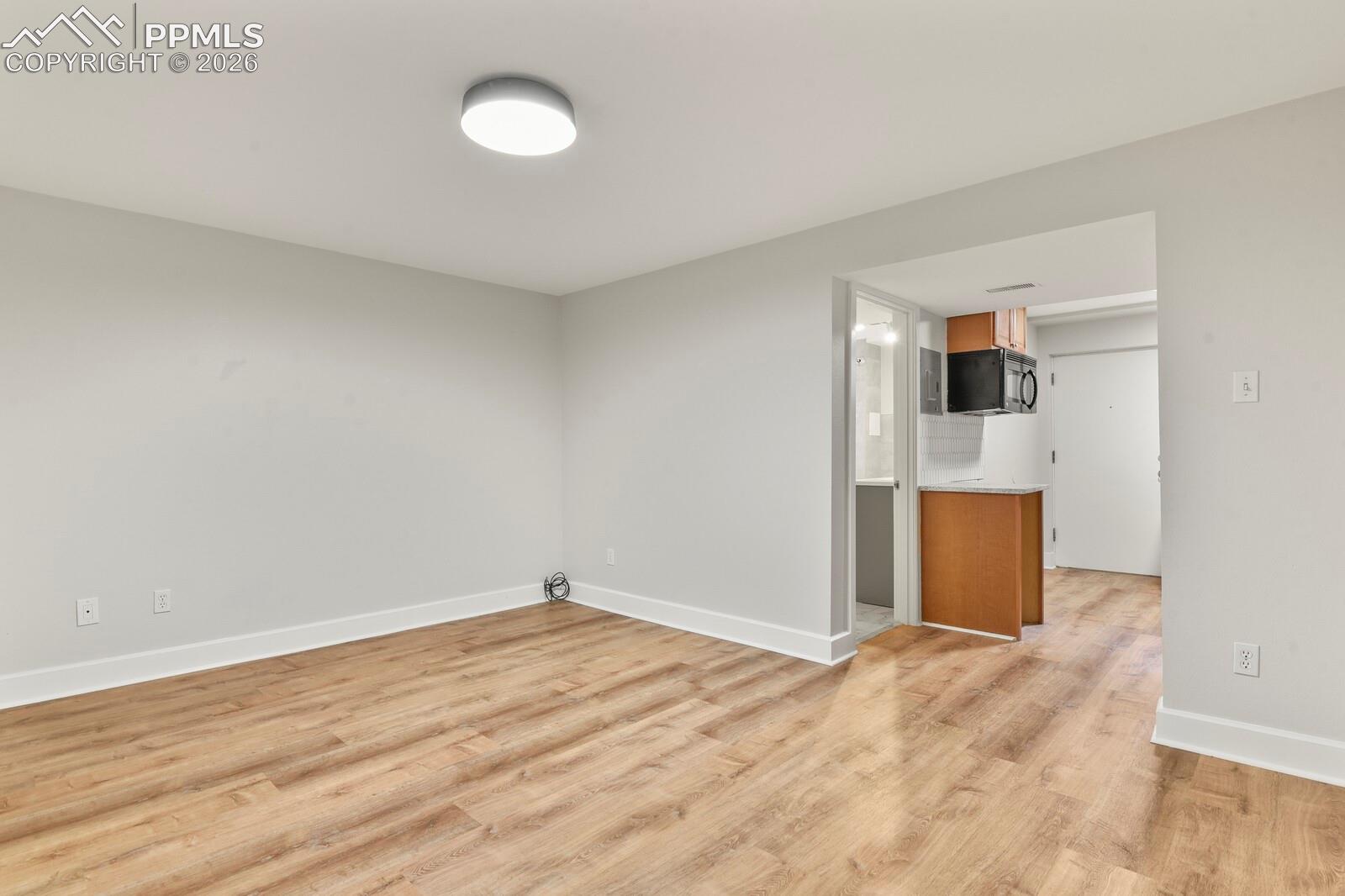 Basement family room featuring LVP flooring 