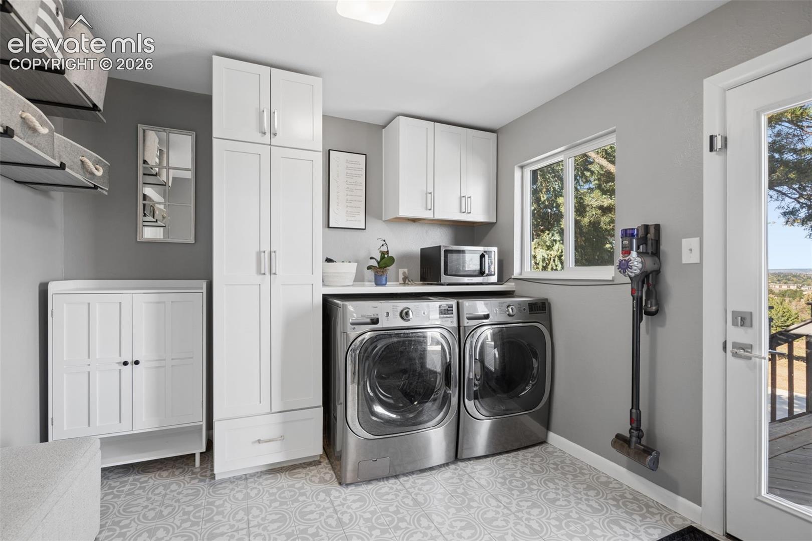 Laundry Main Level with door to back yard 