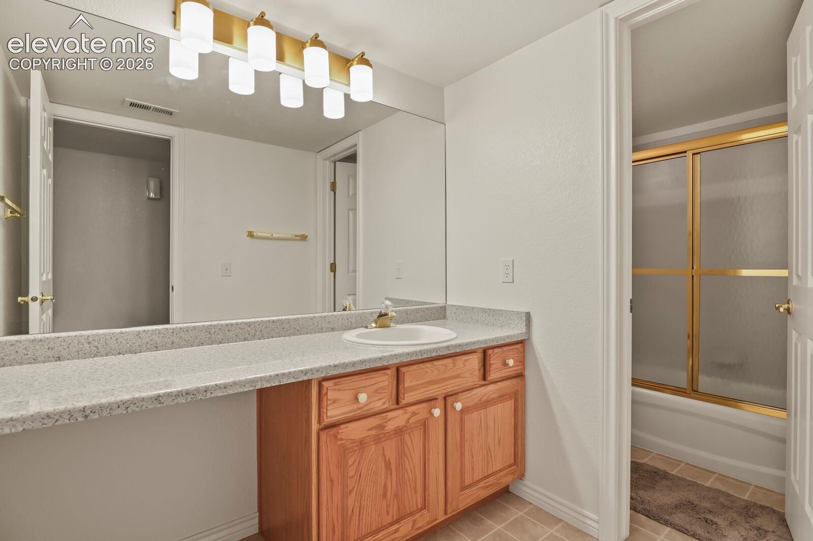 Lower full bath with NEW lighting!