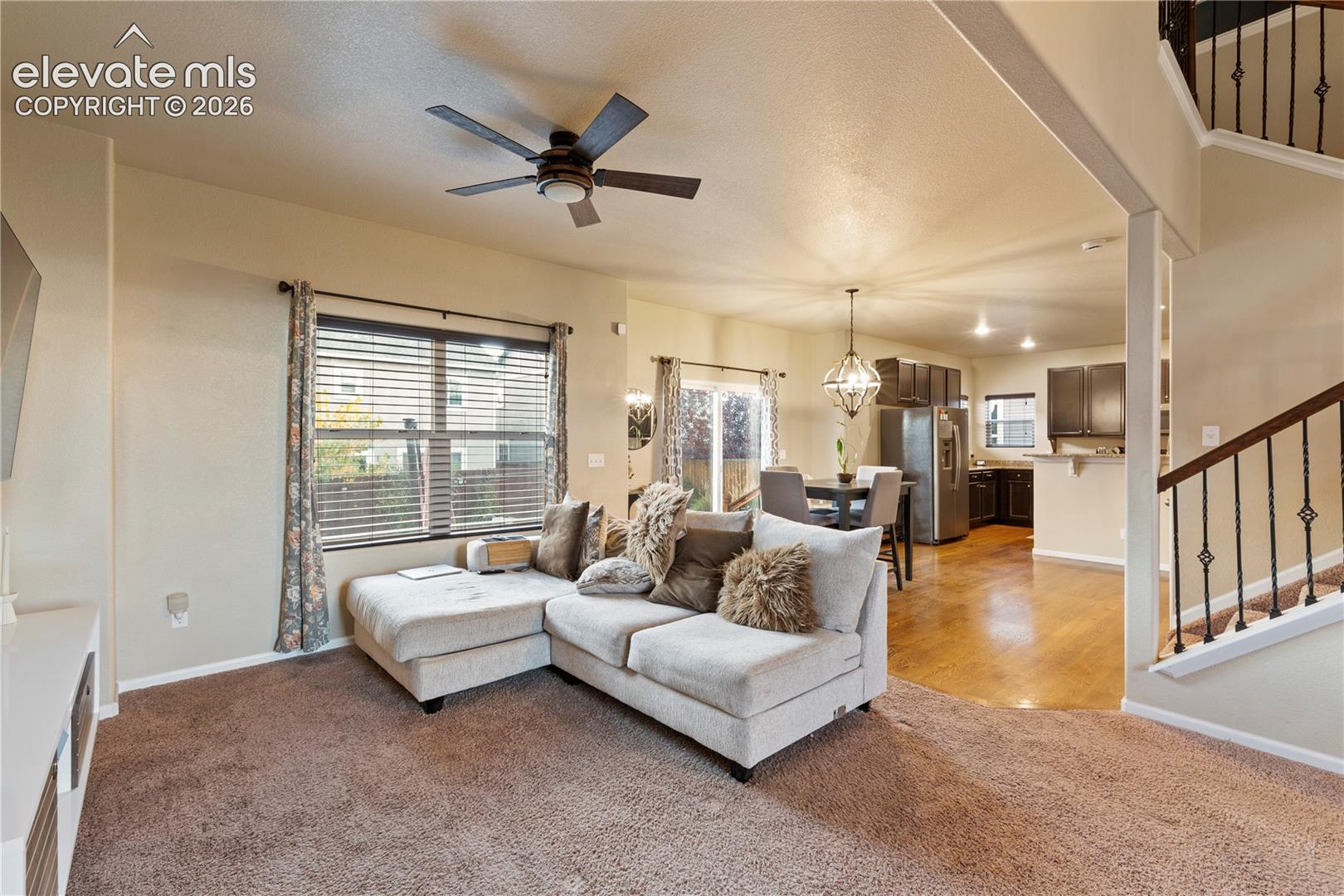Living room opens to the kitchen