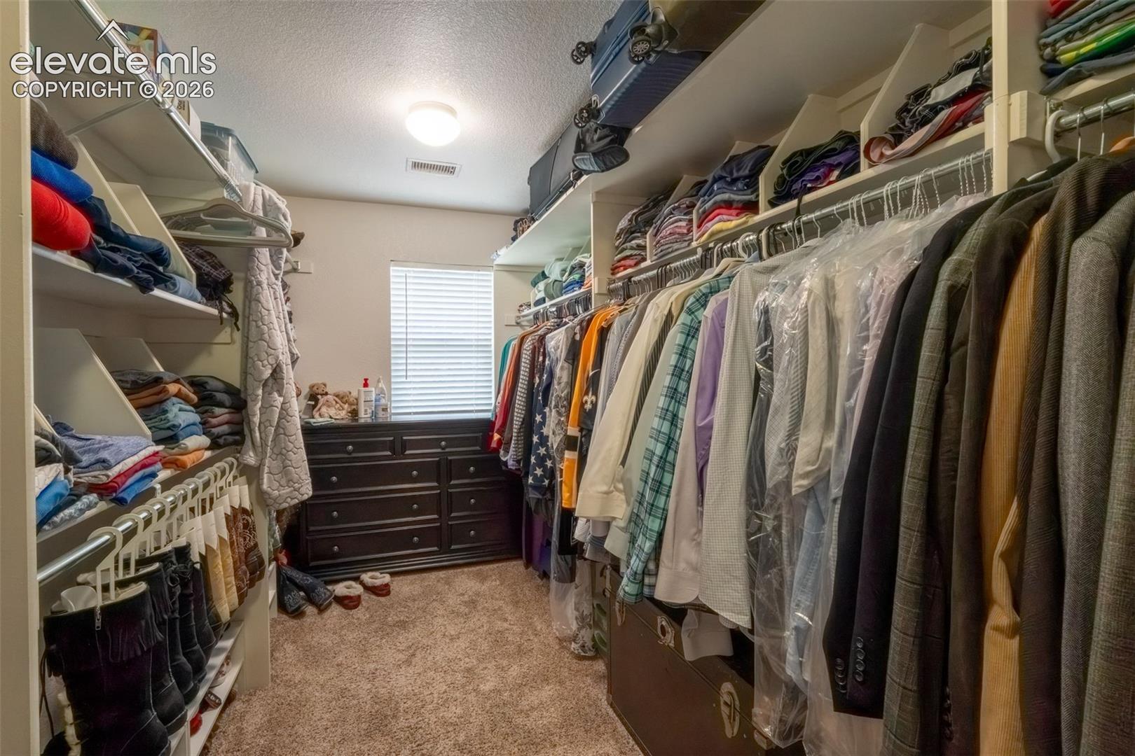 MAIN BEDROOM WALKIN CLOSET