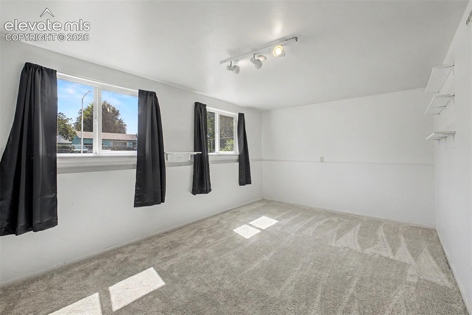 Lower level room offers lots of flexibility as a recreation room, office or another living area. 