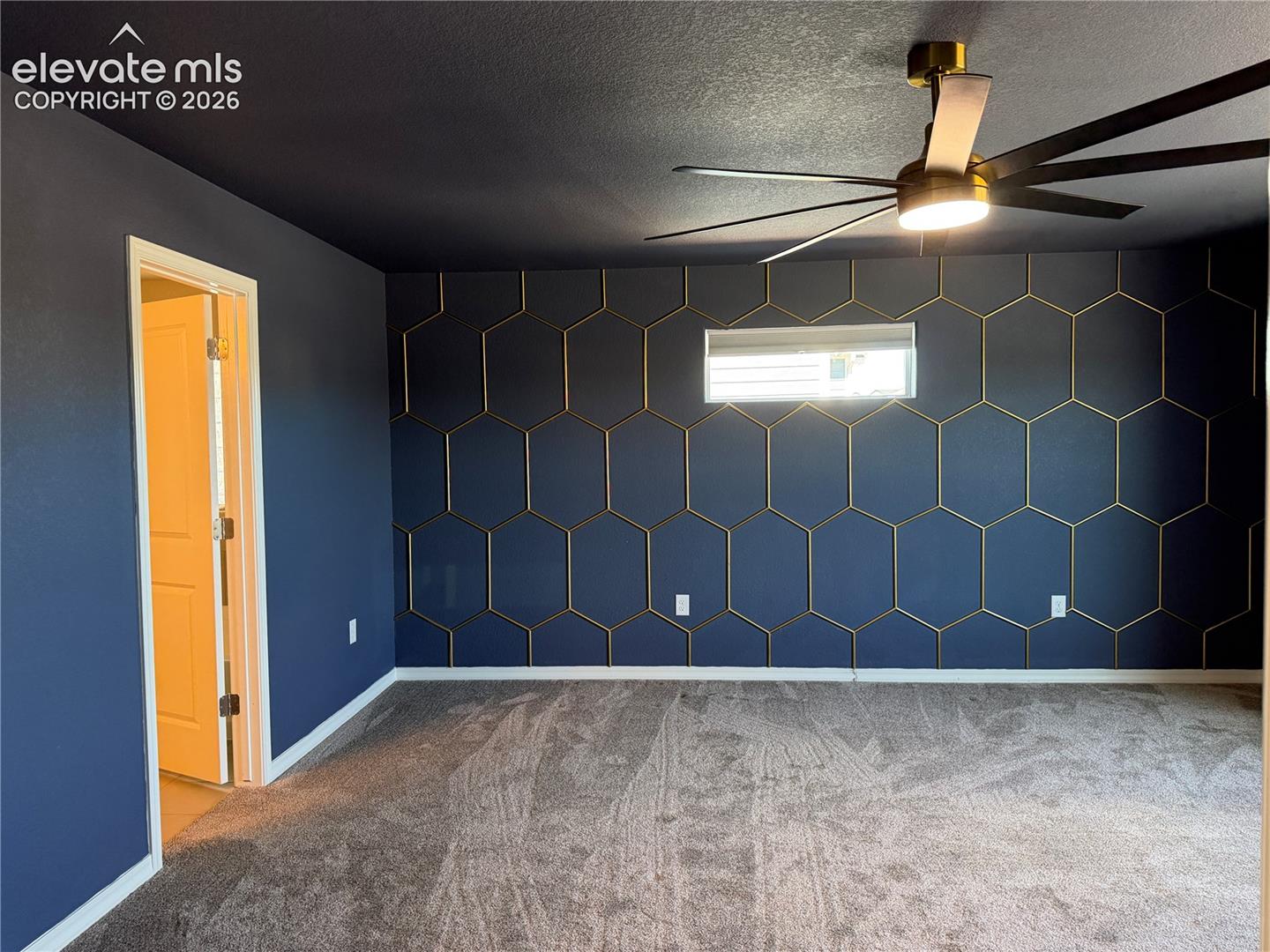 Accent wall featuring hexagonal molding