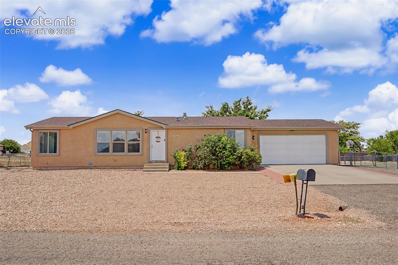 667 S Burro Dr, Pueblo, CO 81007