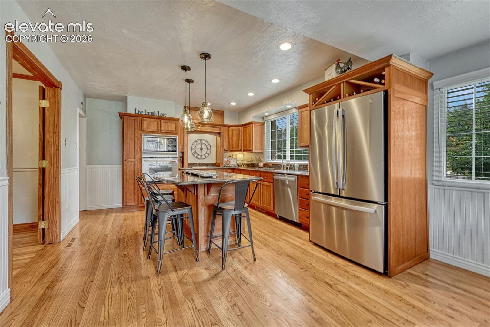 Stainless Steel Appliances & Large Island.