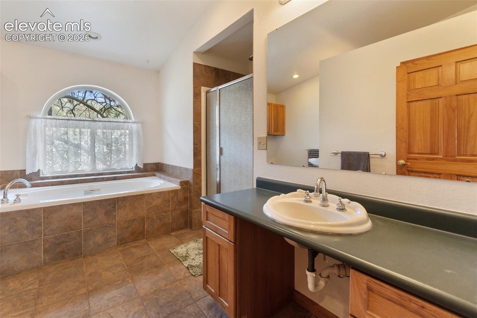 Primary Bathroom with jetted tub. 