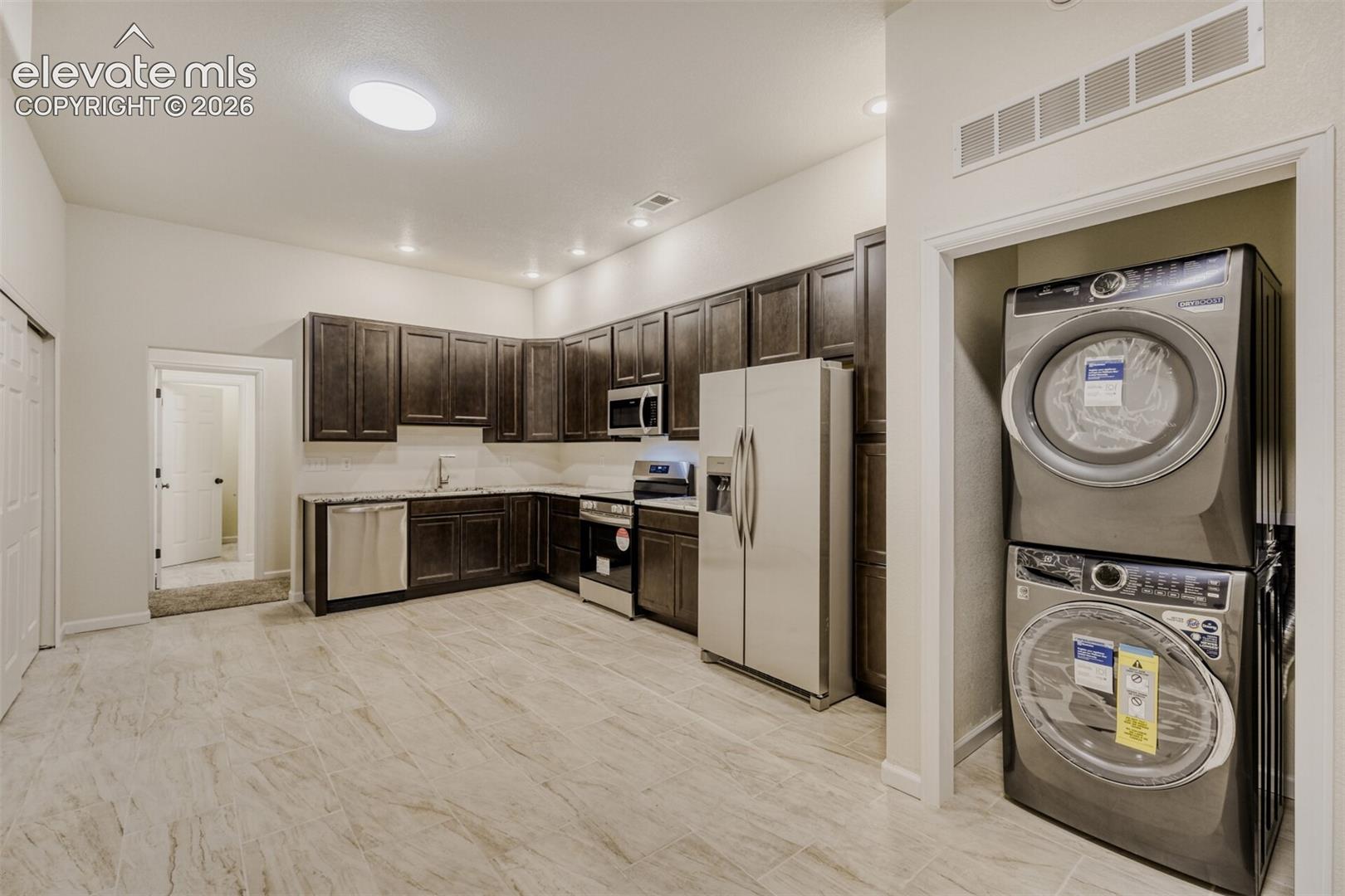 Kitchenette with second laundry 