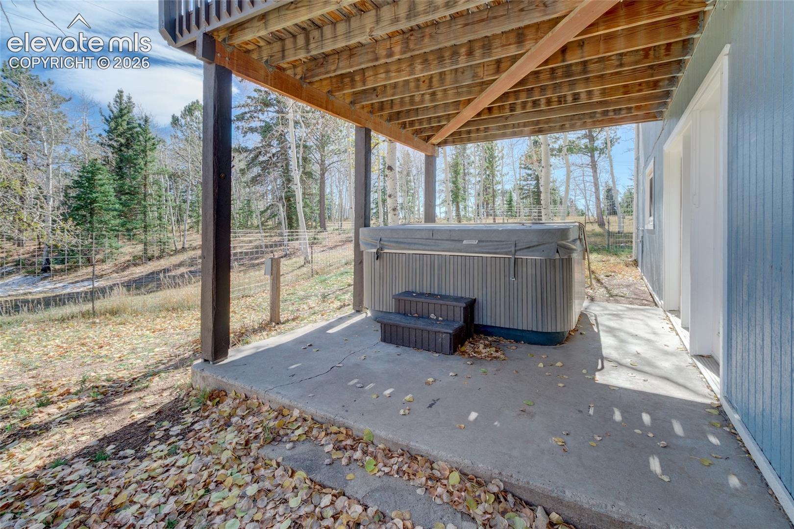 Lower level patio with hot tub