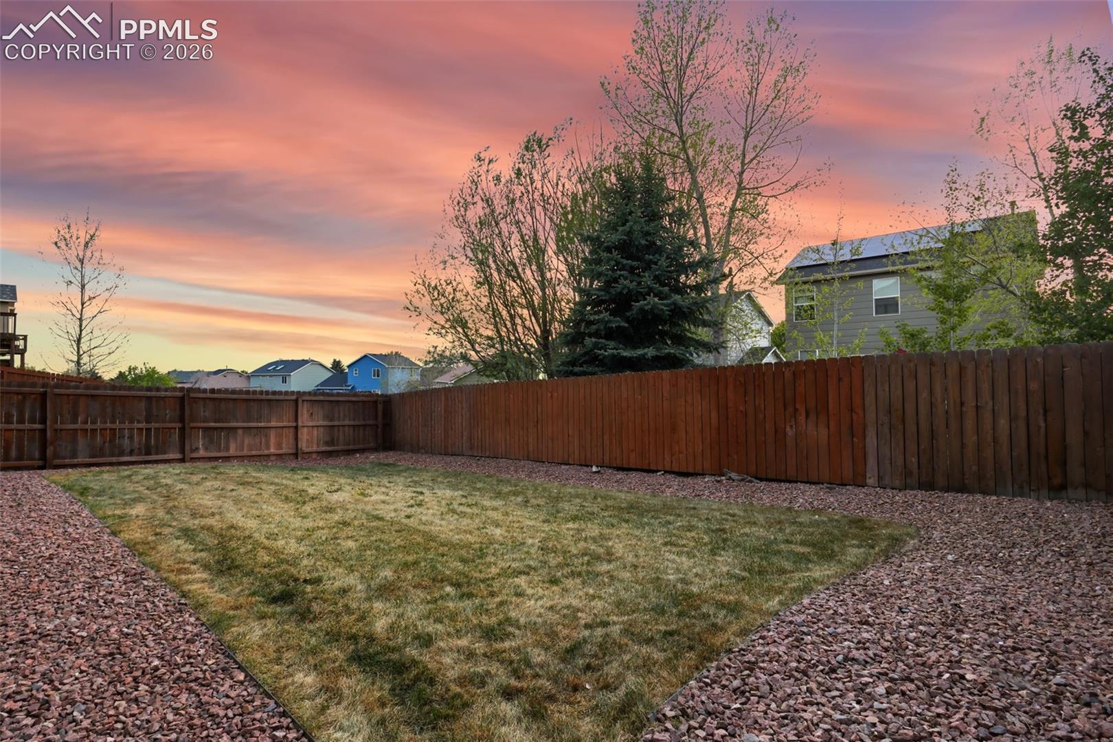 Fully fenced backyard.