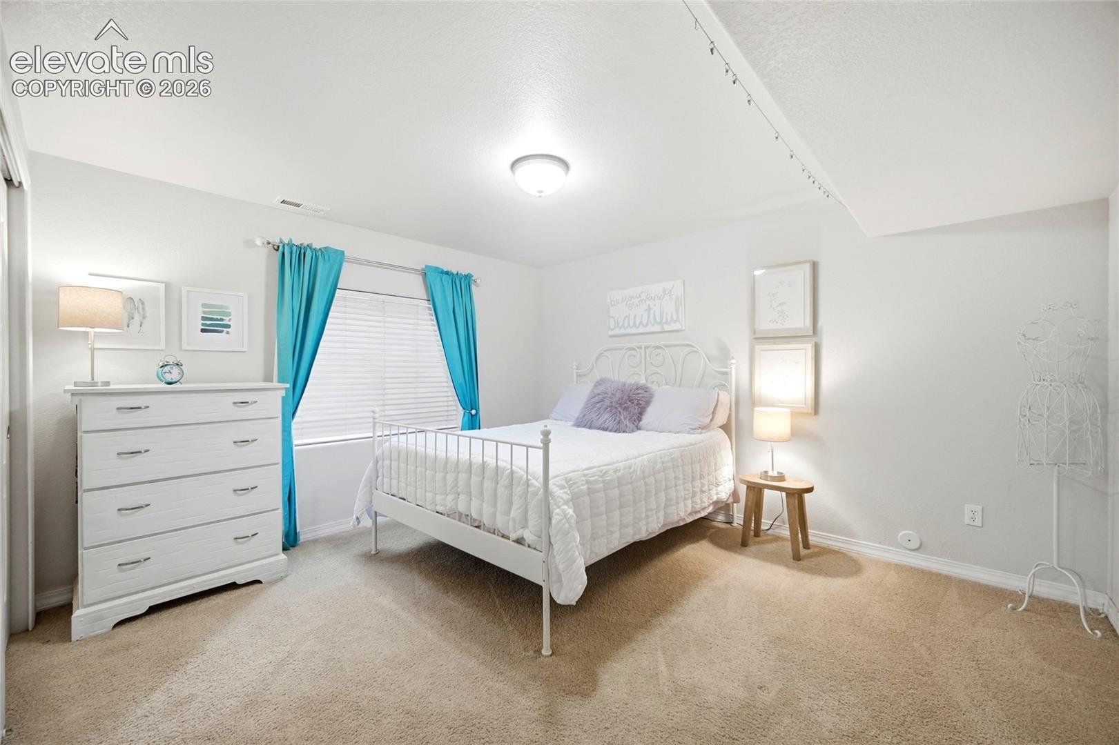 Recessed lighting, window with blinds, carpeted flooring, built-in closet