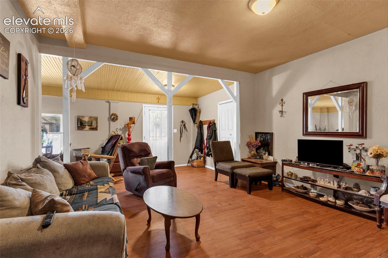 Wood-finish flooring throughout the main living area