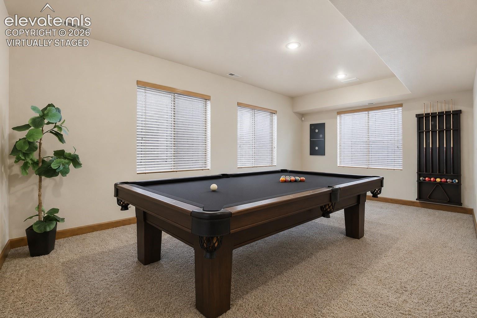 Plenty of room for a pool table! Virtually staged.