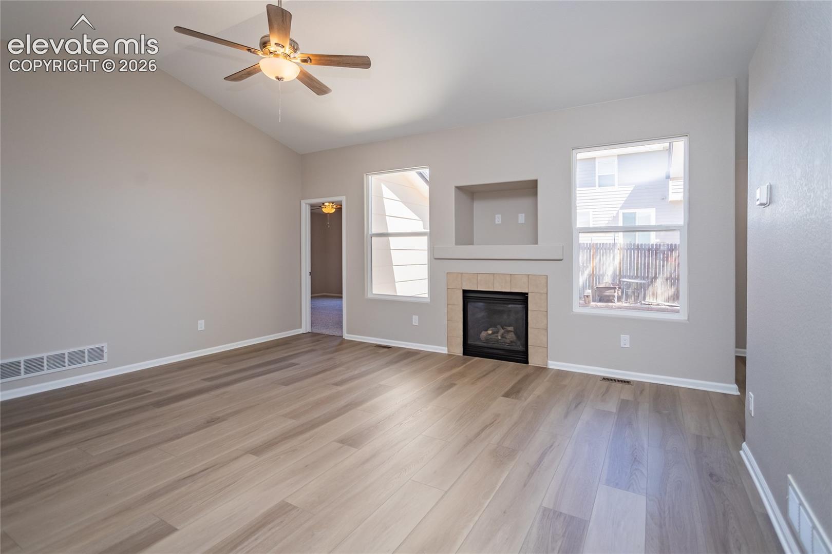 Large windows to let in the light & a gas fireplace for ambiance & cozy Colorado nights!