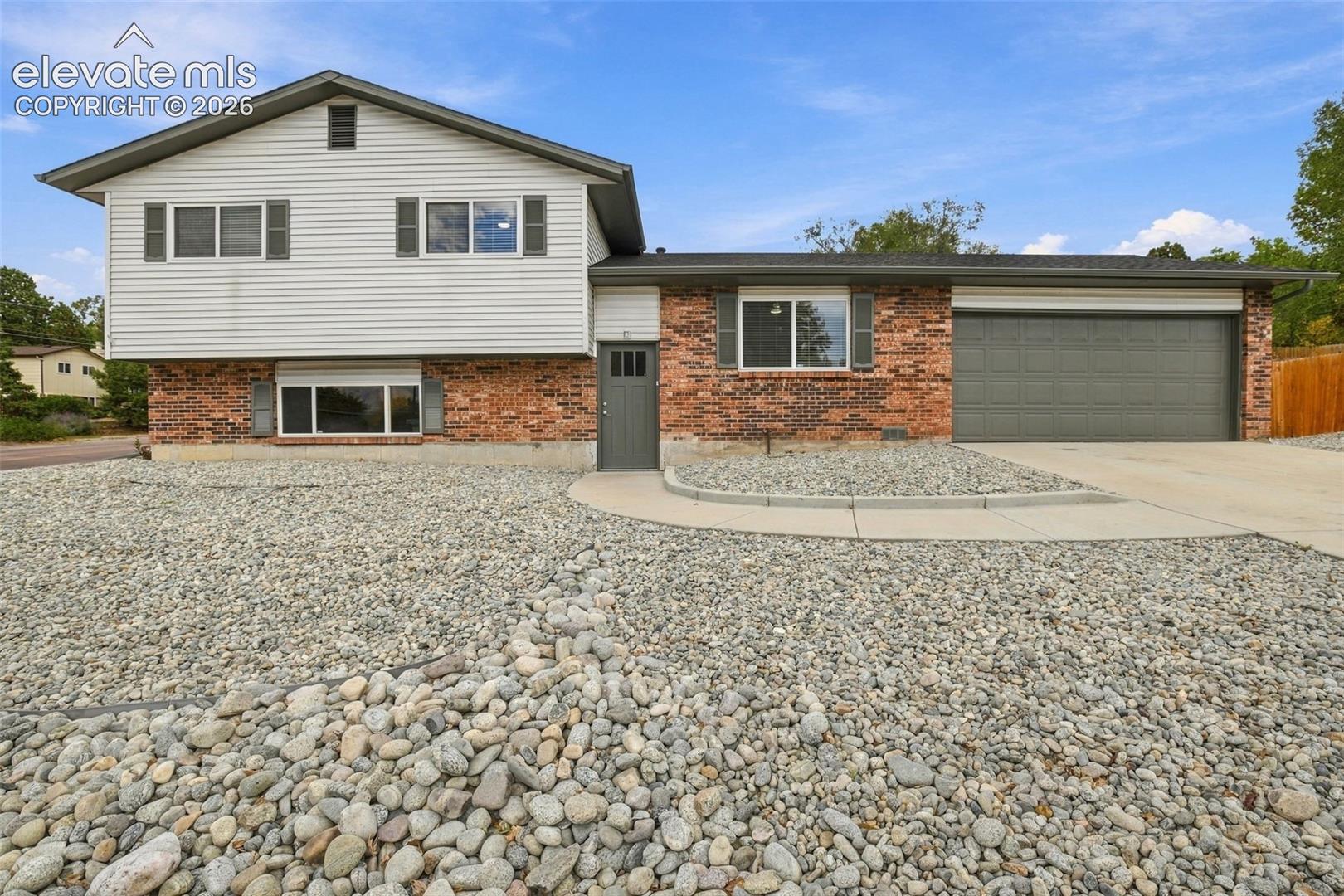 Welcome to the desirable Crestmoor Park neighborhood! Offering 5 bedrooms, 2 bathrooms, and 1,620 square feet, this extensively updated home combines fresh modern finishes, low-maintenance living, and an exceptional Colorado Springs location. With improvements throughout, much of the work has already been done, making this home ready for its next owner!Step inside to discover fresh interior paint, new carpet, luxury vinyl plank flooring, updated light fixtures, and new ceiling fans in every room. The beautifully refreshed kitchen features all-new cabinetry, quartz countertops, a farmhouse sink, and a complete suite of new appliances, including a range/oven, microwave, refrigerator, and dishwasher. An updated bathroom vanity adds another fresh touch, while a brand-new roof provides additional peace of mind. Outside, fresh landscaping incorporates low-maintenance features for easy upkeep.The location is equally impressive! Situated just four doors down from Danville Park, you'll enjoy convenient access to a playground, basketball court, ball field, and covered picnic area. The University of Colorado Colorado Springs (UCCS) is within walking distance, while nearby Austin Bluffs Open Space and Pulpit Rock Trail offer outstanding opportunities for hiking, exploring, and enjoying Colorado's beautiful outdoors.Shopping, dining, and everyday essentials are just minutes away, including Trader Joe's, Costco, Lowe's, Starbucks, and some of Colorado Springs' favorite restaurants. With five bedrooms offering flexibility for guests, a home office, or additional living needs, this property delivers both versatility and value. Extensive updates, an established neighborhood, and an outstanding location make this Crestmoor Park home an opportunity you won't want to miss!