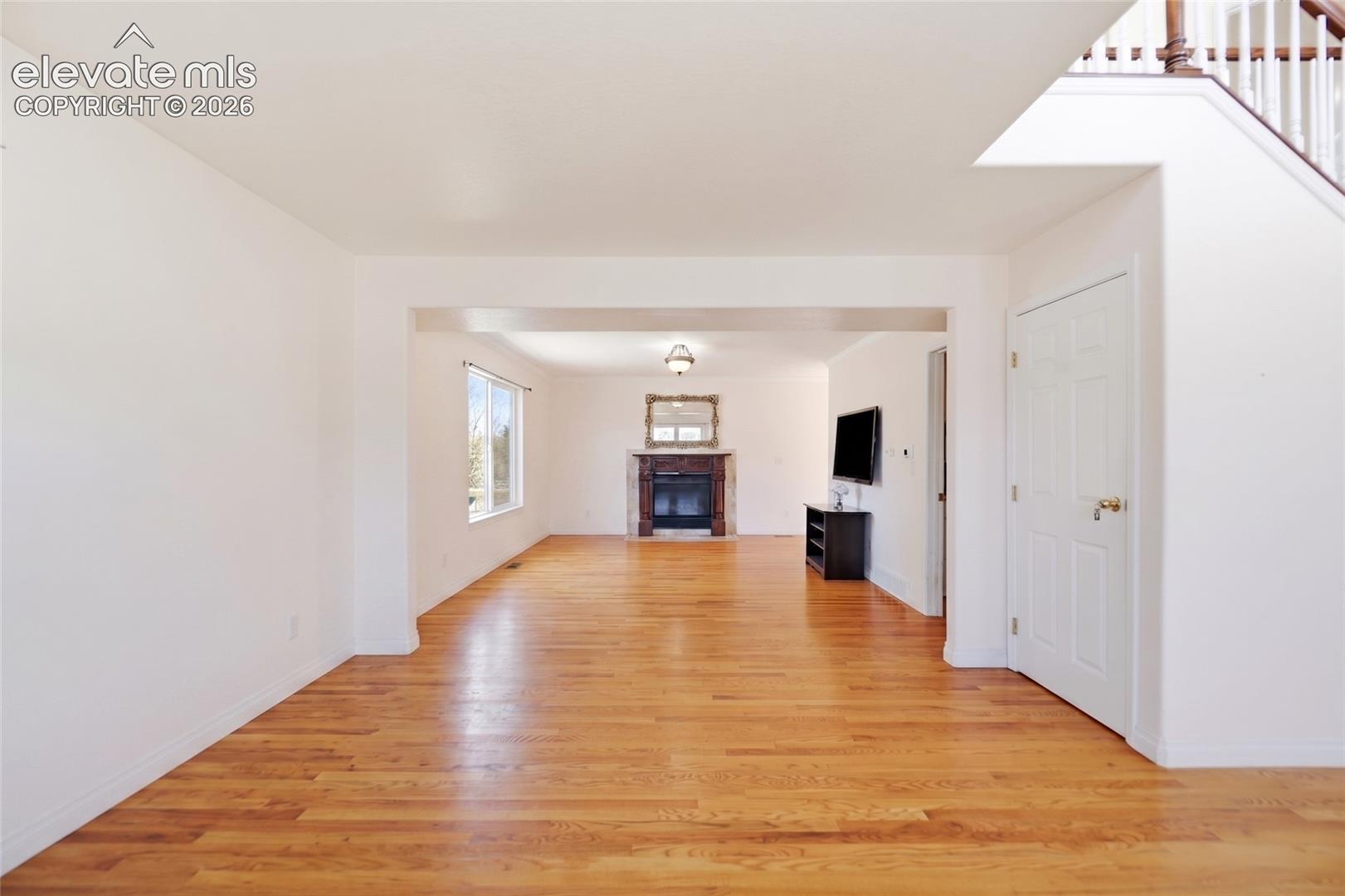 Hardwood flooring throughout the main living area
