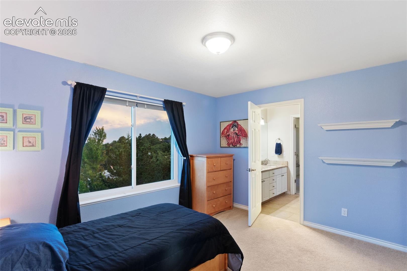 Upper Level Bedroom 2 with connecting bathroom 