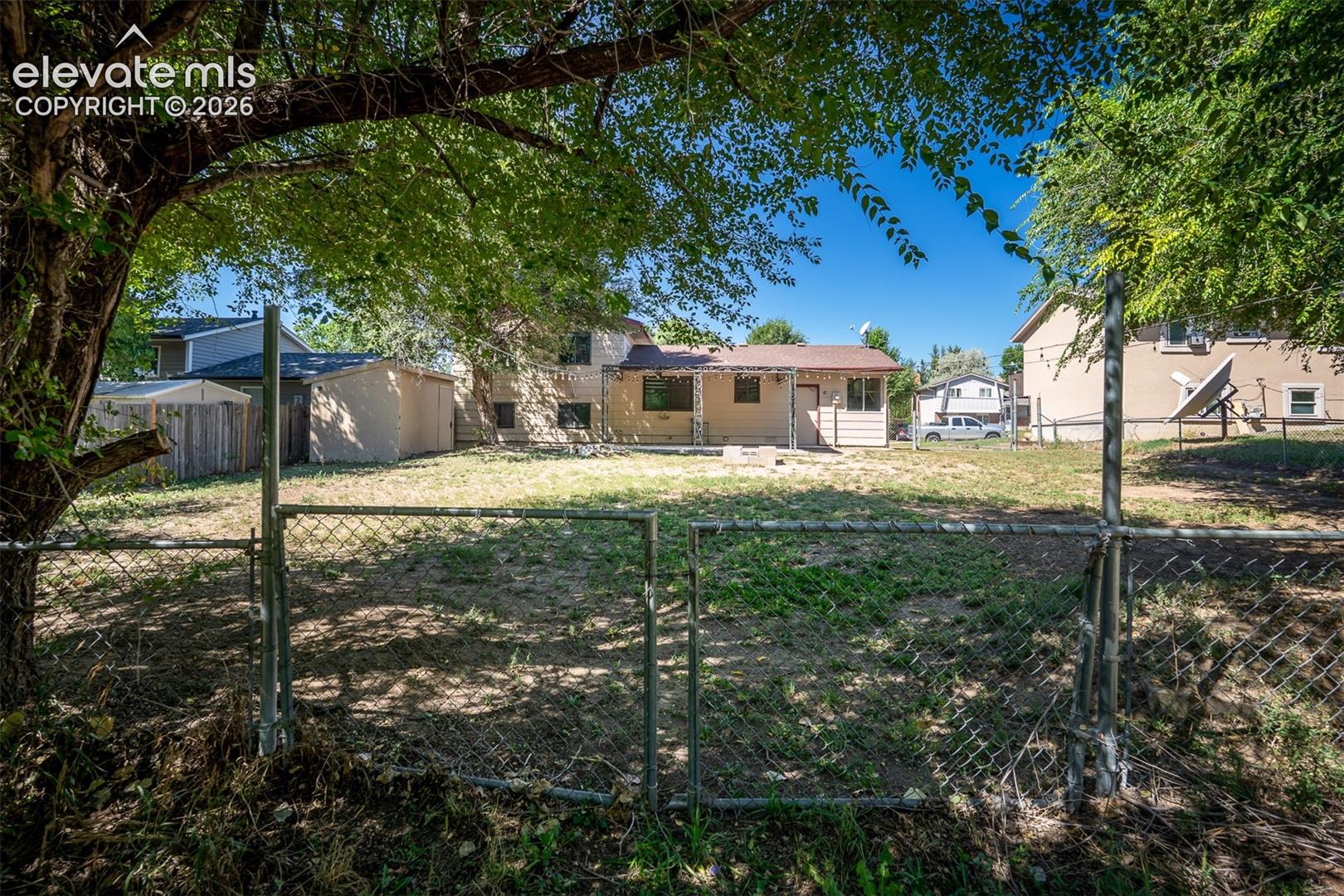 Rear Spacious Back Yard With Parking And A Gate