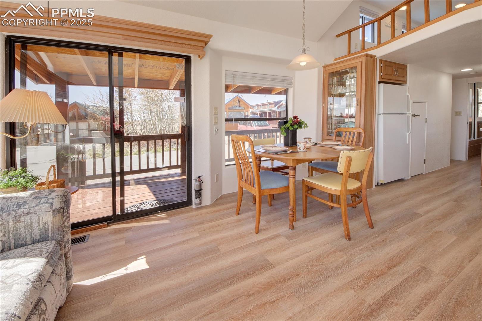 Dining Area Showcasing Lots Of Natural Light