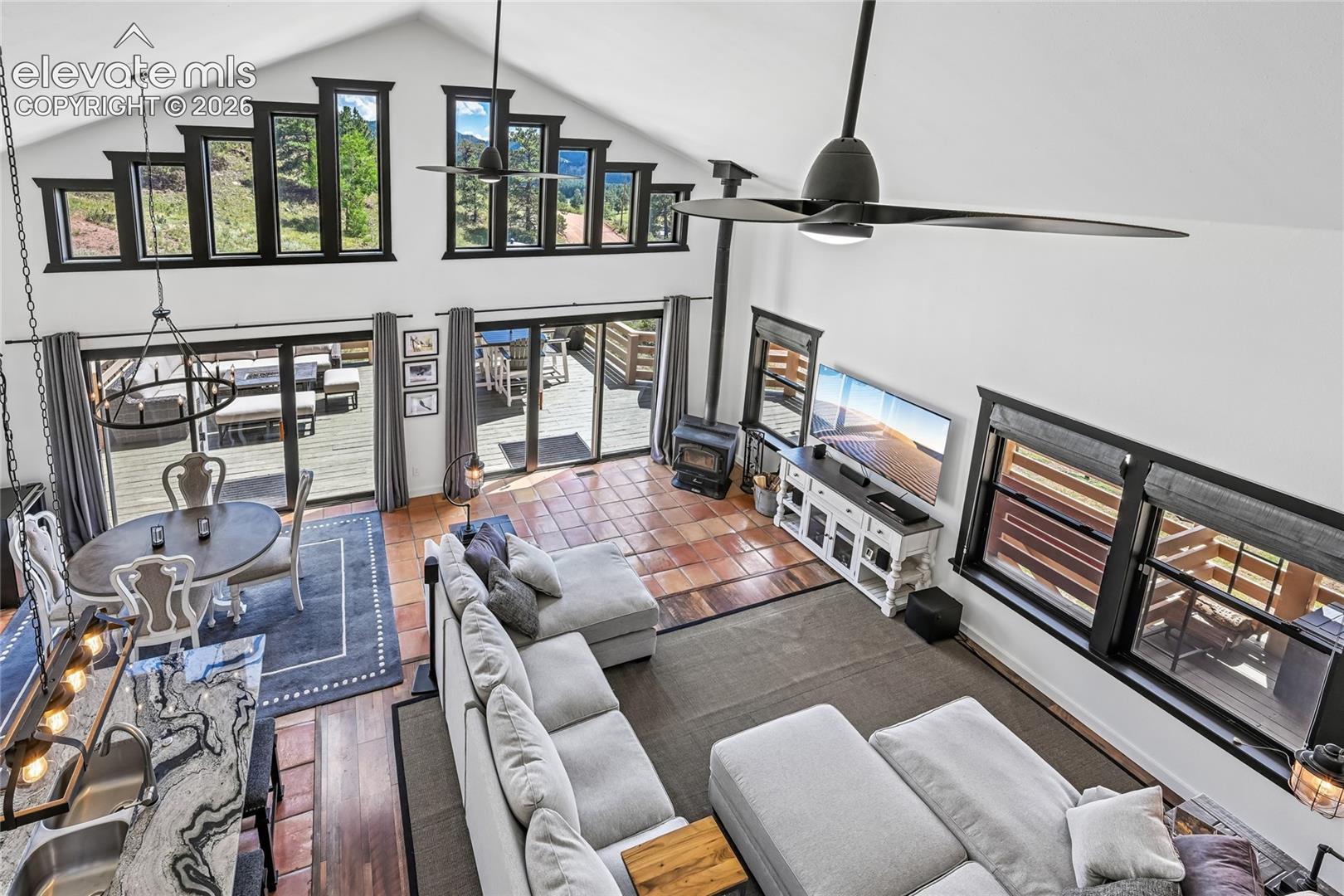 View of Kitchen, Dining Room and Living Room from loft