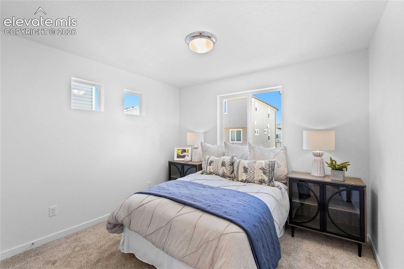 Recessed lighting, two square windows, and a sliding glass door
*photos of a model home*