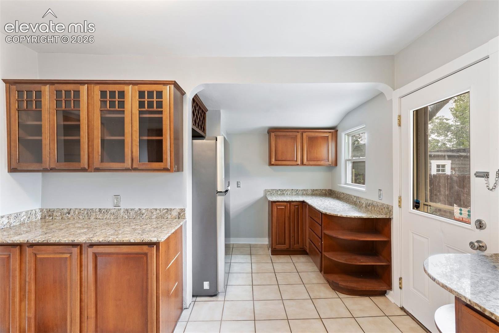 Update kitchen, walk out access, granite counters