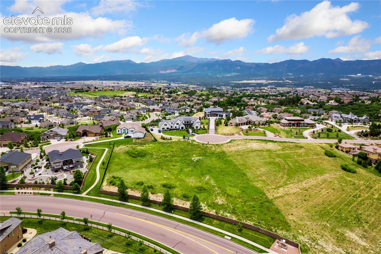 Mountain views on a private, gated cul-de-sac 1.56 acre lot.  