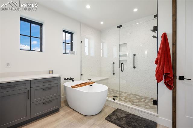 Both lower level bedrooms feature private ensuites, but one is a deluxe 5-piece with walk-in shower and freestanding tub.
