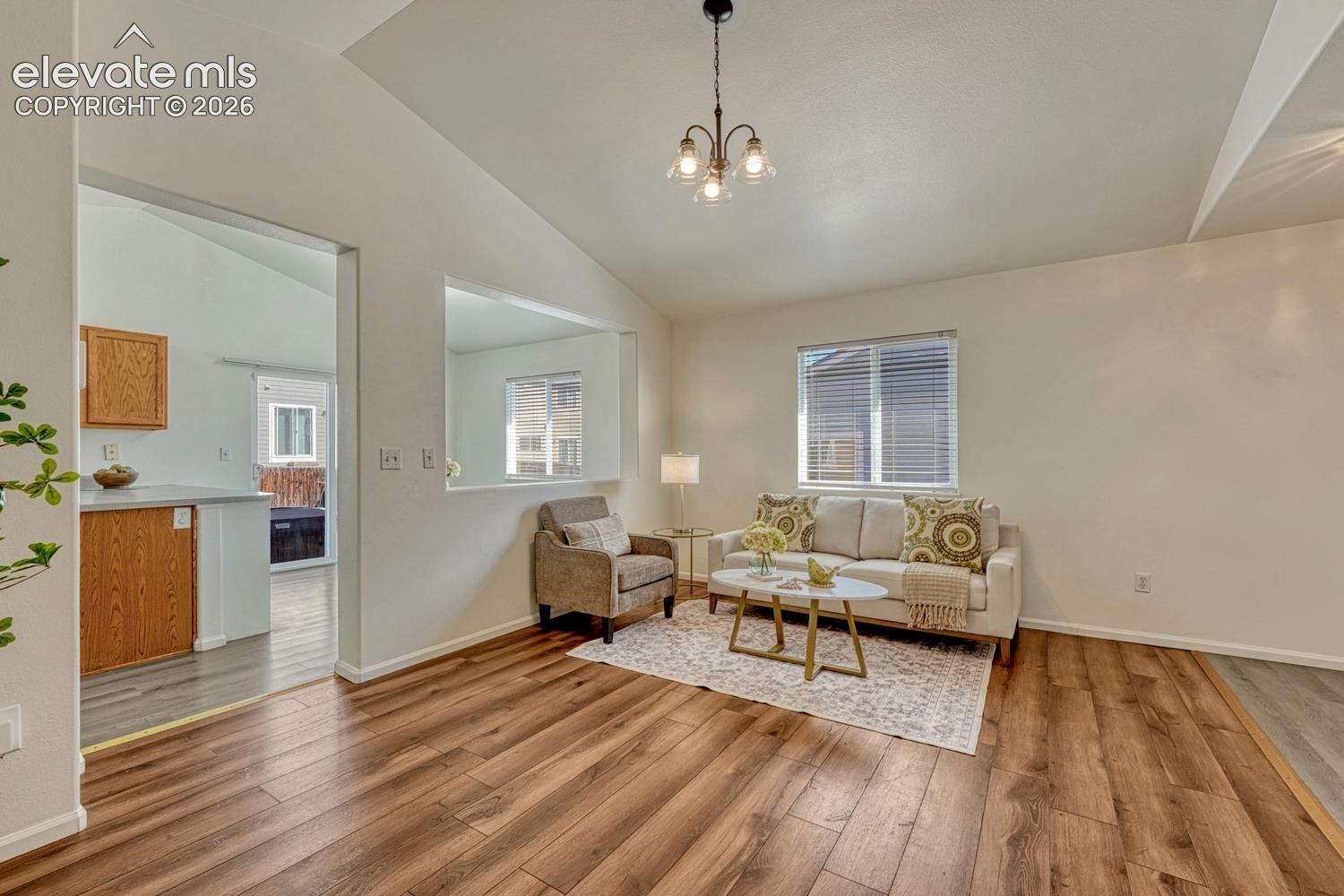 View into the Kitchen and Dining Area from the Living Room.