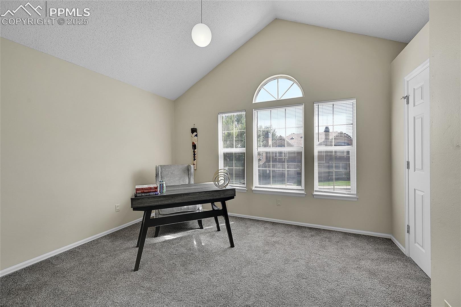 Other UL bedroom with vaulted ceiling adj. bathroom.