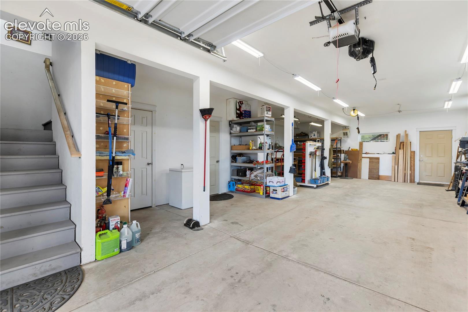 Big 2 car tandem garage with heat and room for workshop