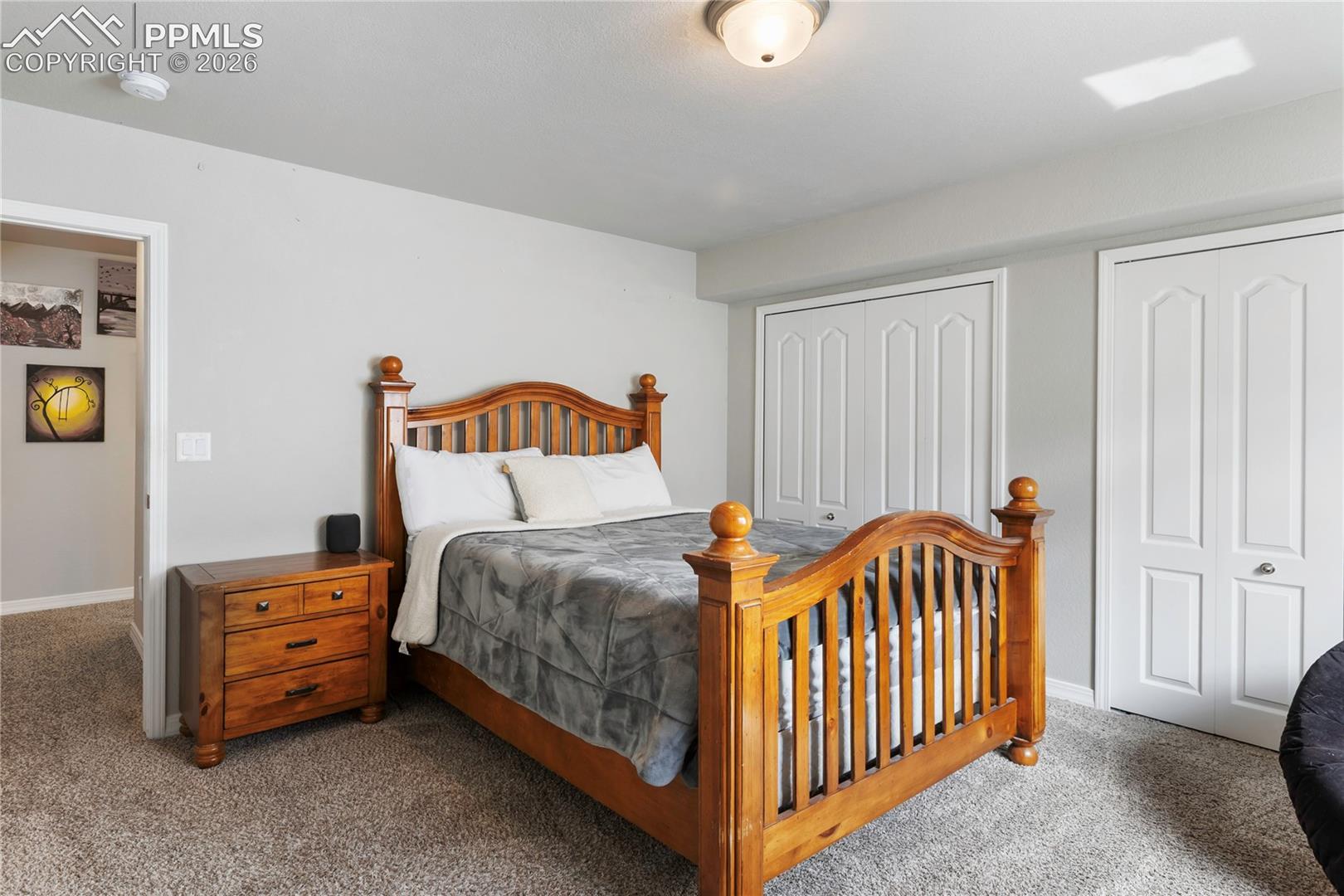 Spacious bedroom with ample room and clean, modern finishes