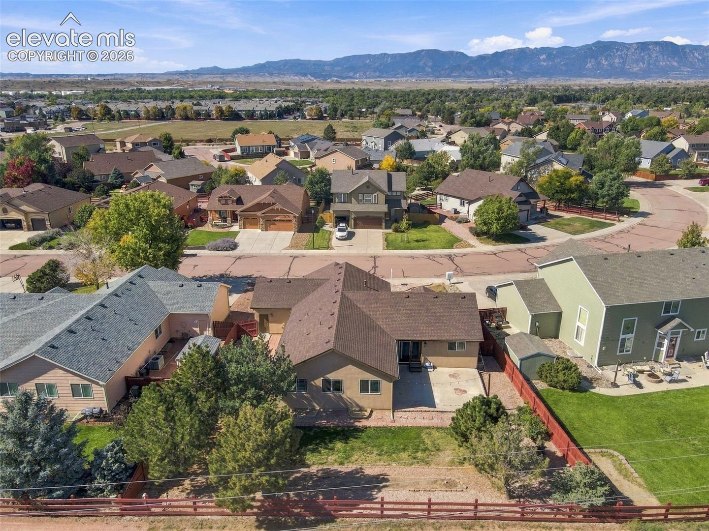 Residential neighborhood with mountain backdrop