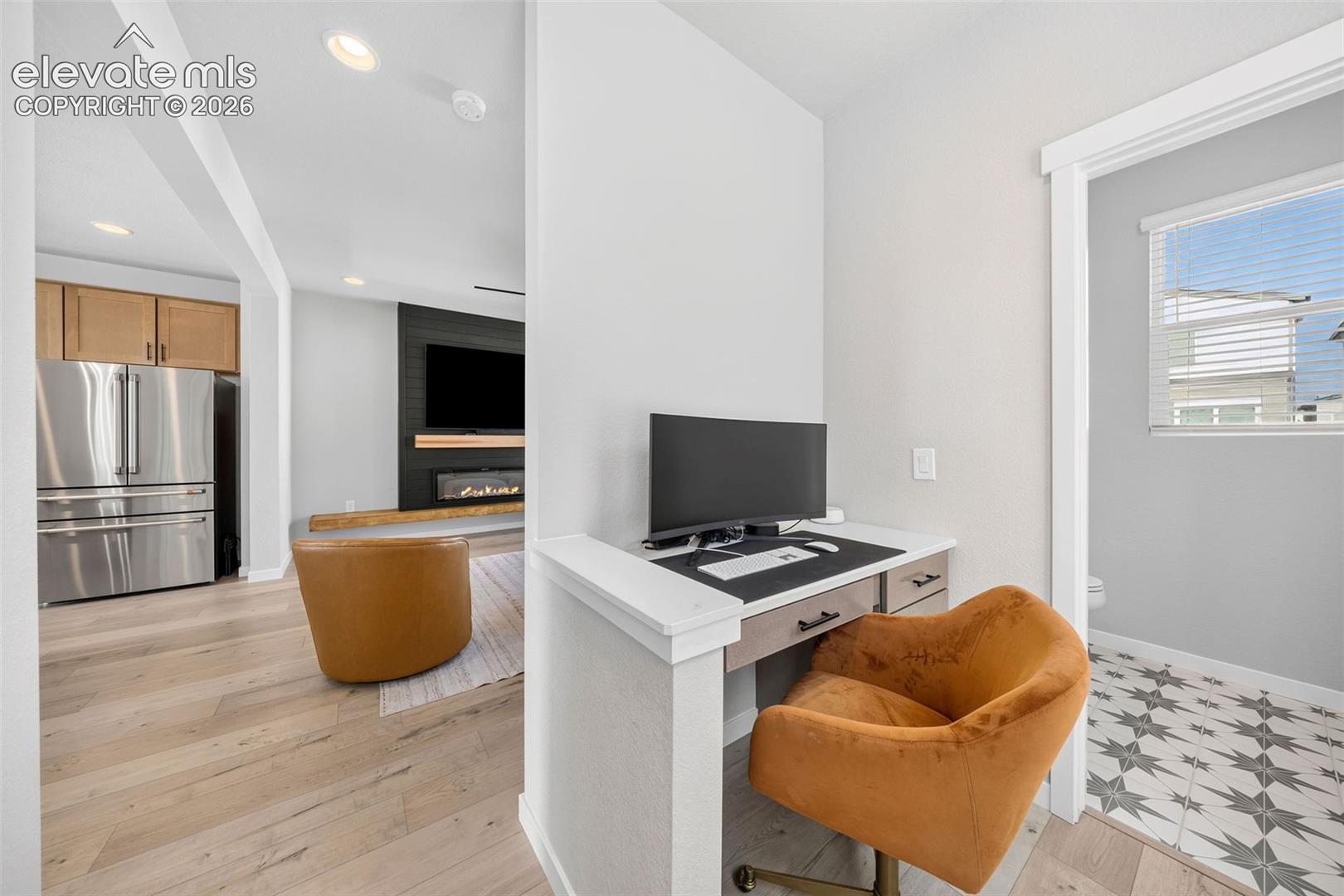WFH? NP. This office space on the main floor has easy access to the living and dining rooms, and there's a powder bath right there. No excuses now to meet those deadlines. 