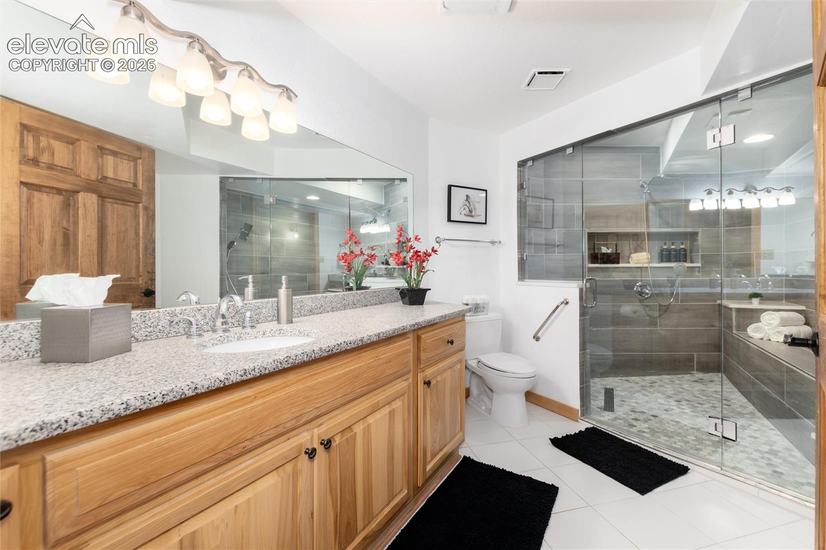 Lower lever updated bathroom with full walk in shower
