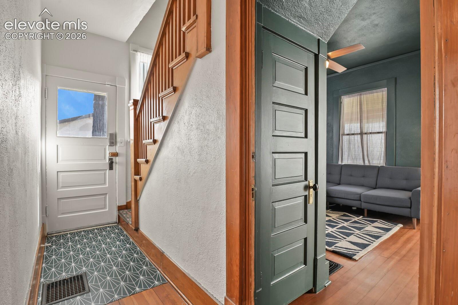 Easy conversion back to a two-unit configuration by adding a wall at the staircase with separate side entrance.
