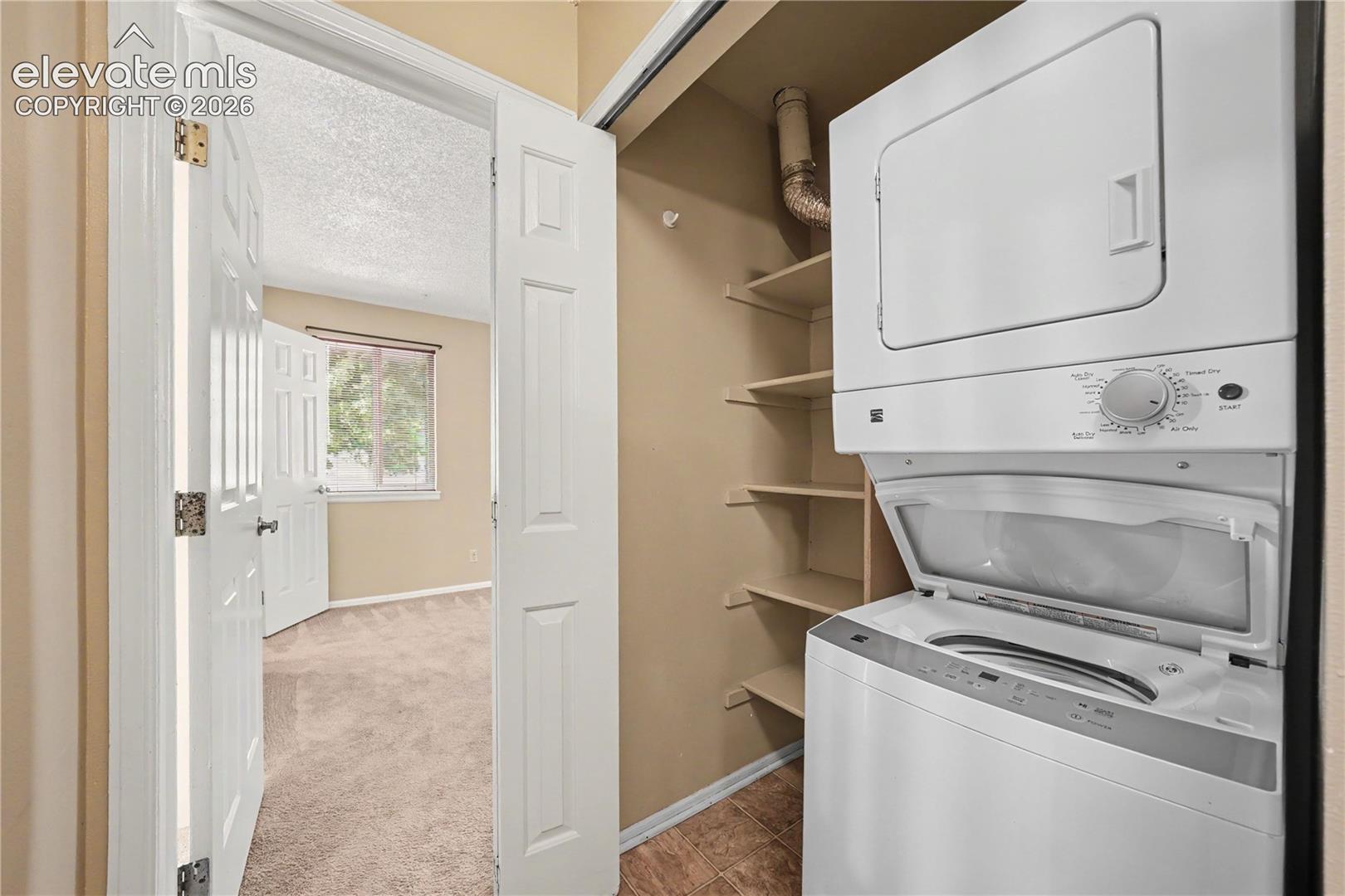 Laundry area with washer and dryer included