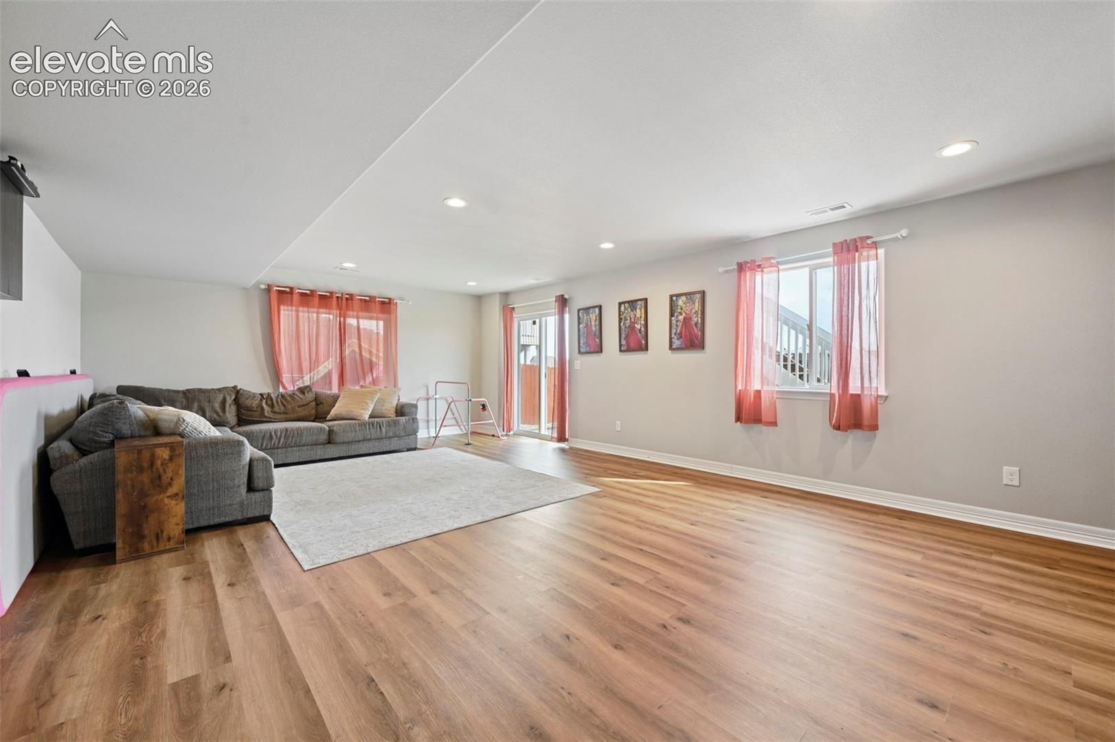 basement family room- sliders to the backyard