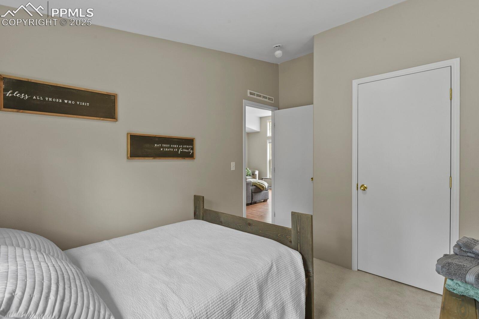 View of carpeted bedroom