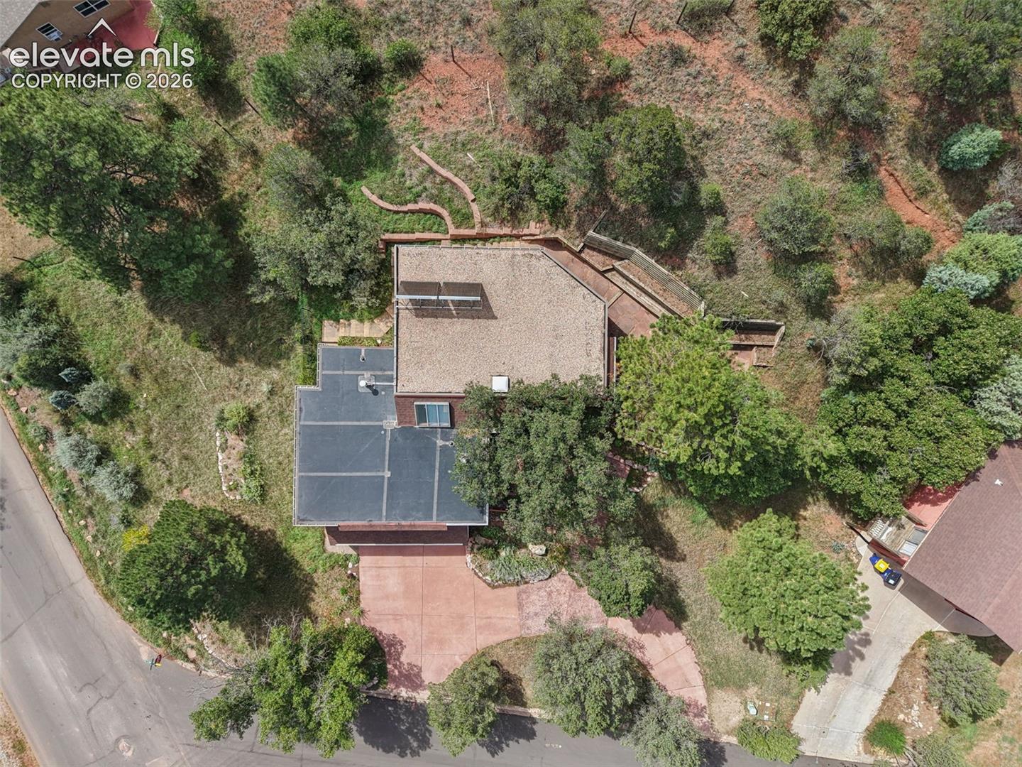 Bird's eye view of the hillside lot.