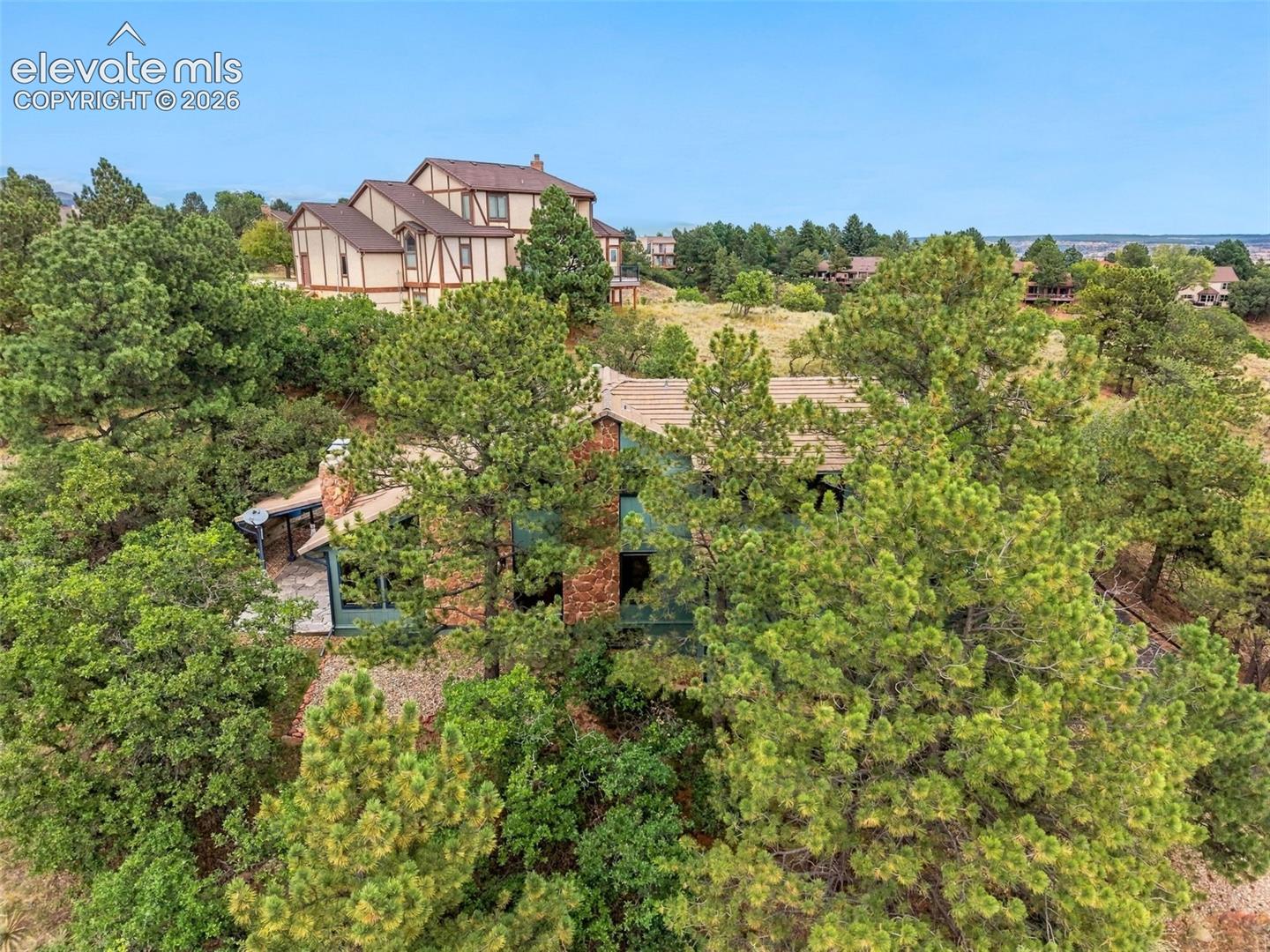 Tucked into the trees for a beautiful setting and privacy.