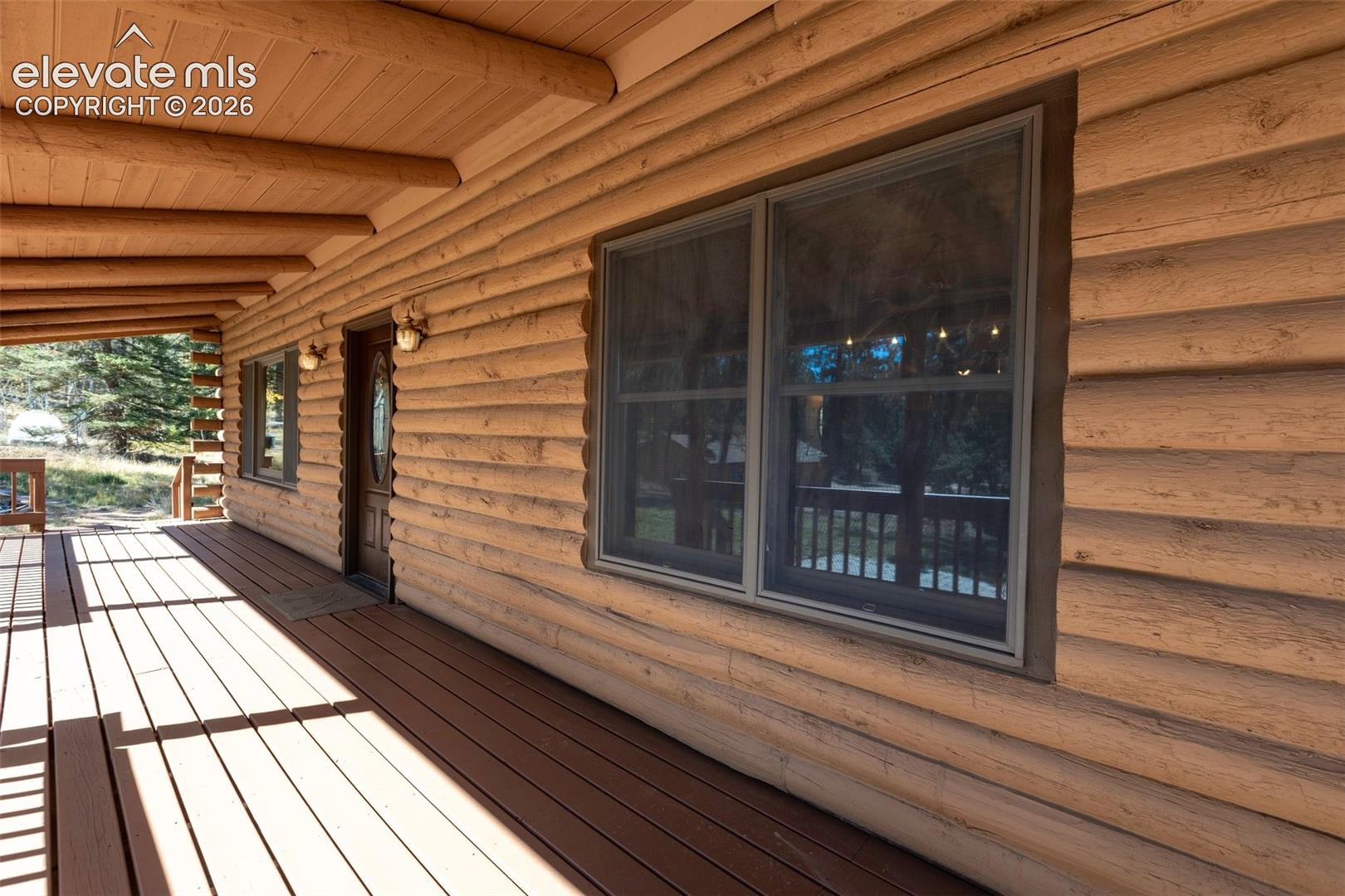 Covered front porch. New stain.