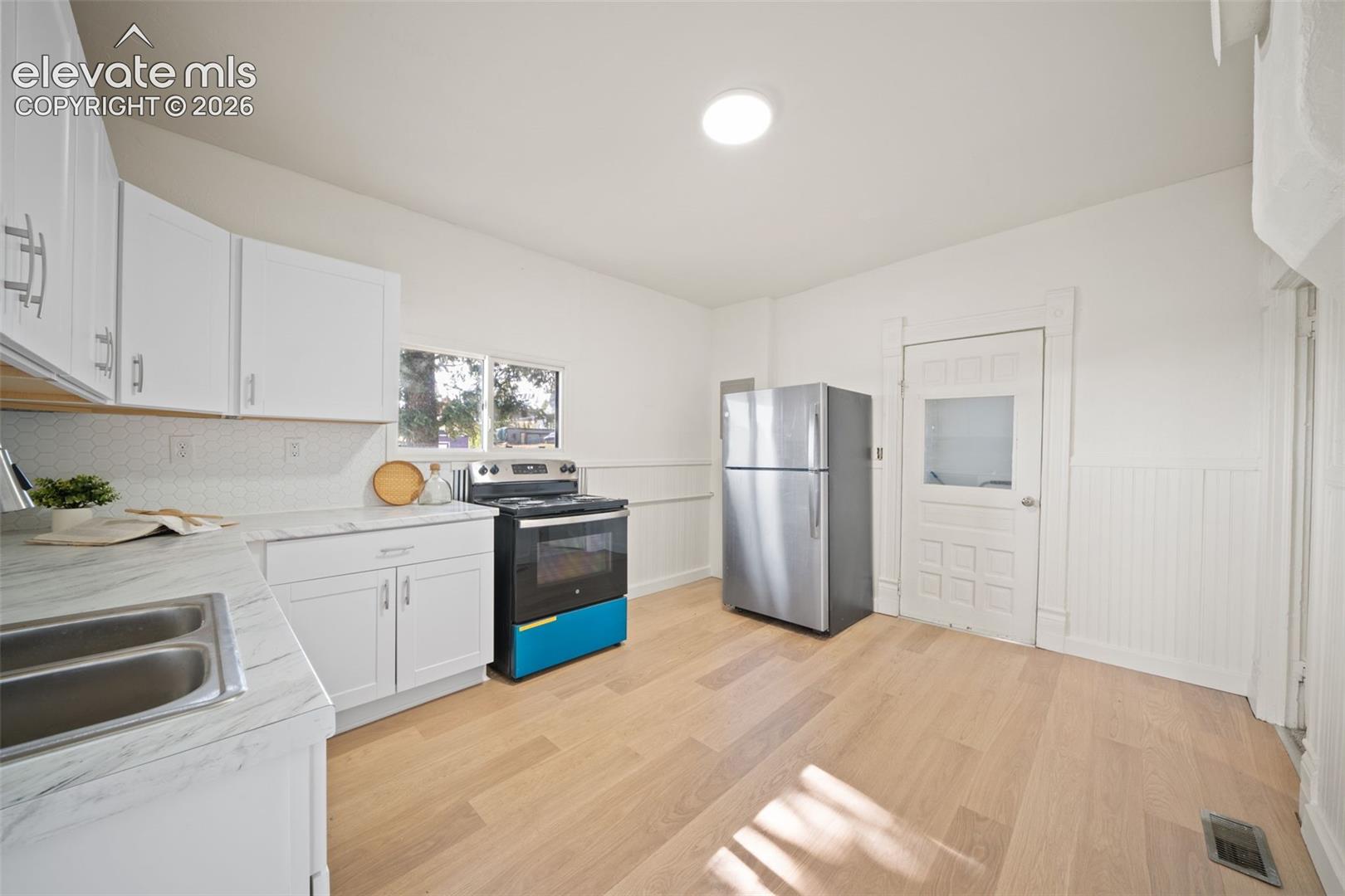 Fresh paint, new flooring, and new appliances