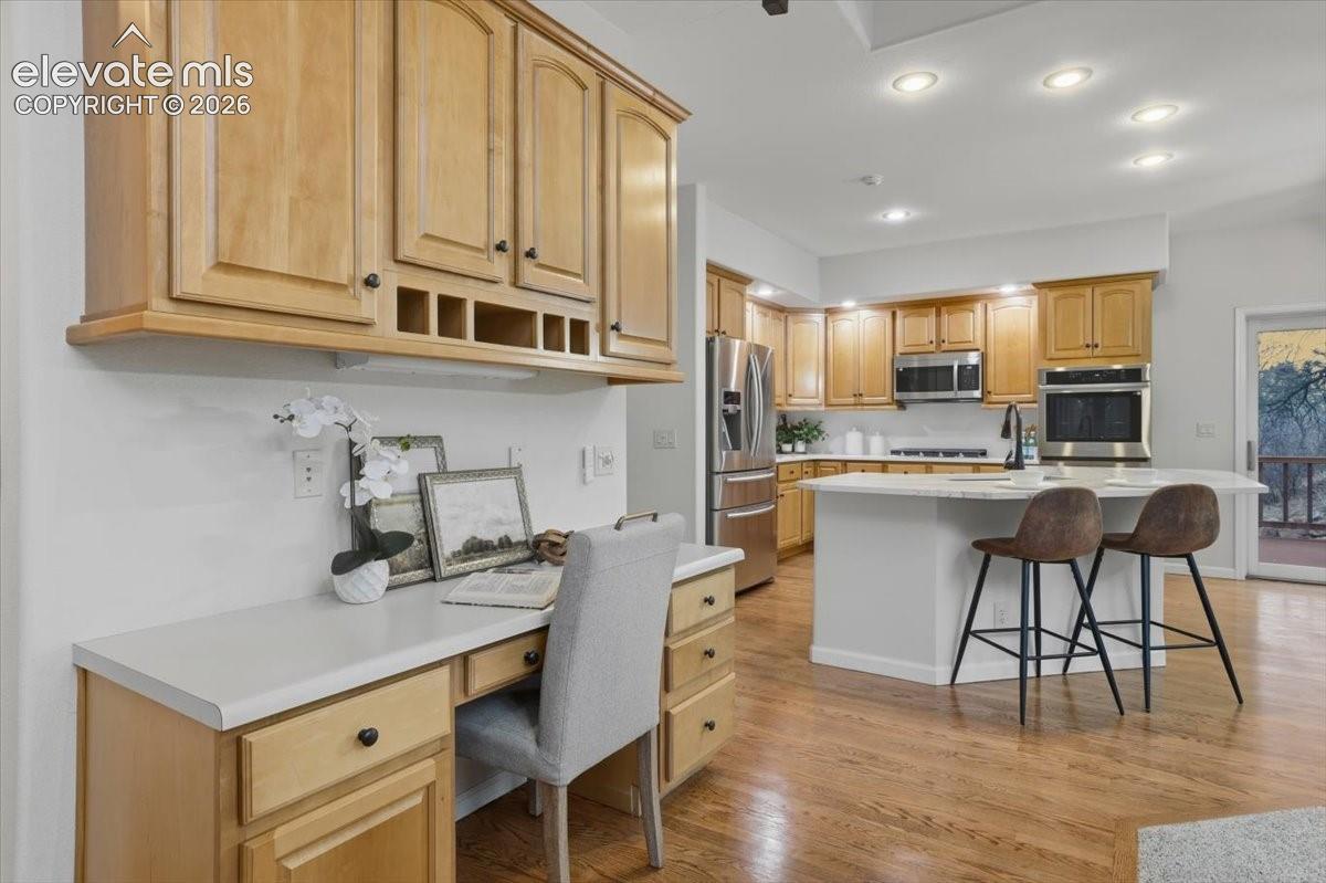 Built-in desk area with wood cabinetry
