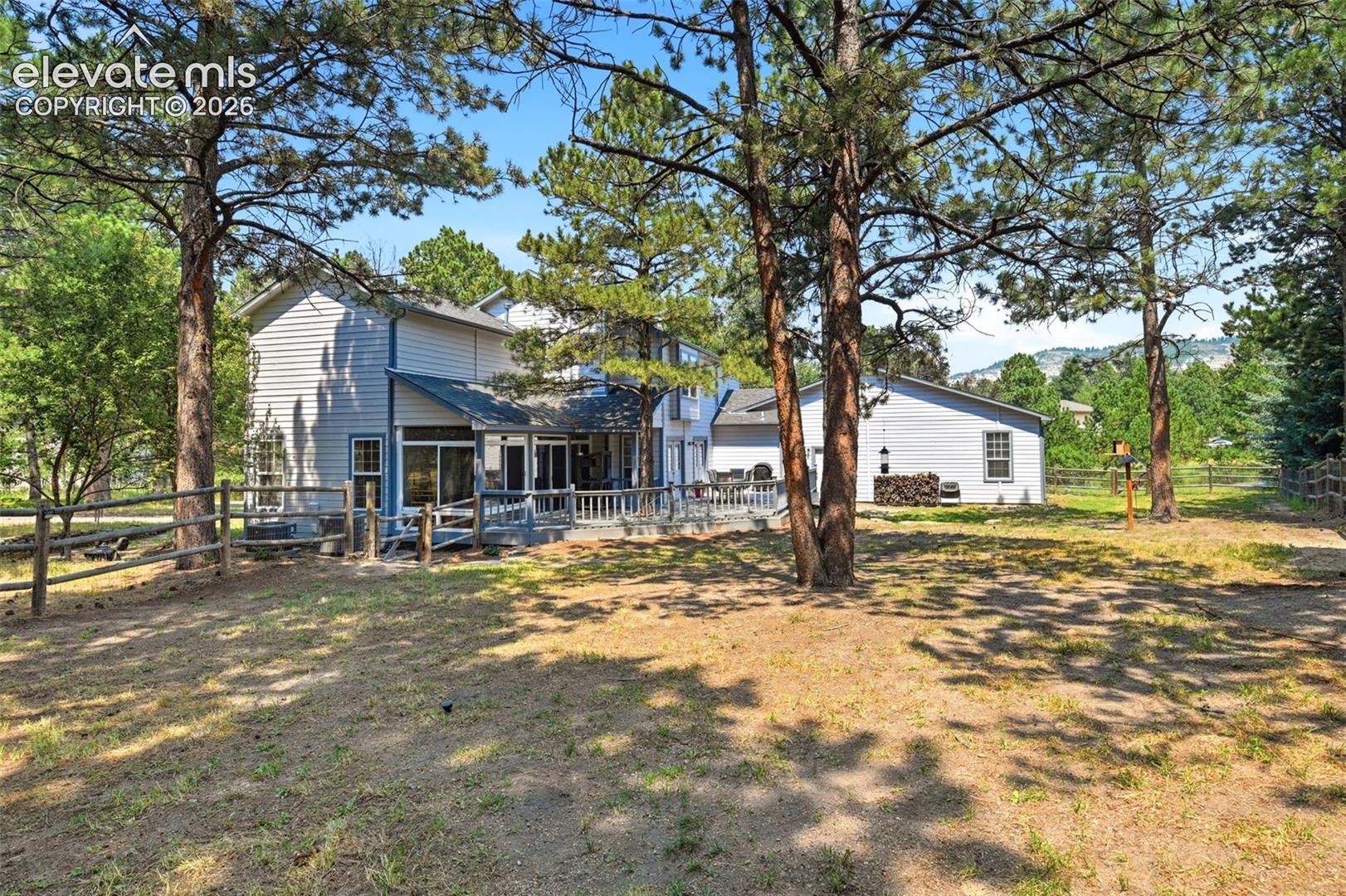 Treed and fenced room to run back yard