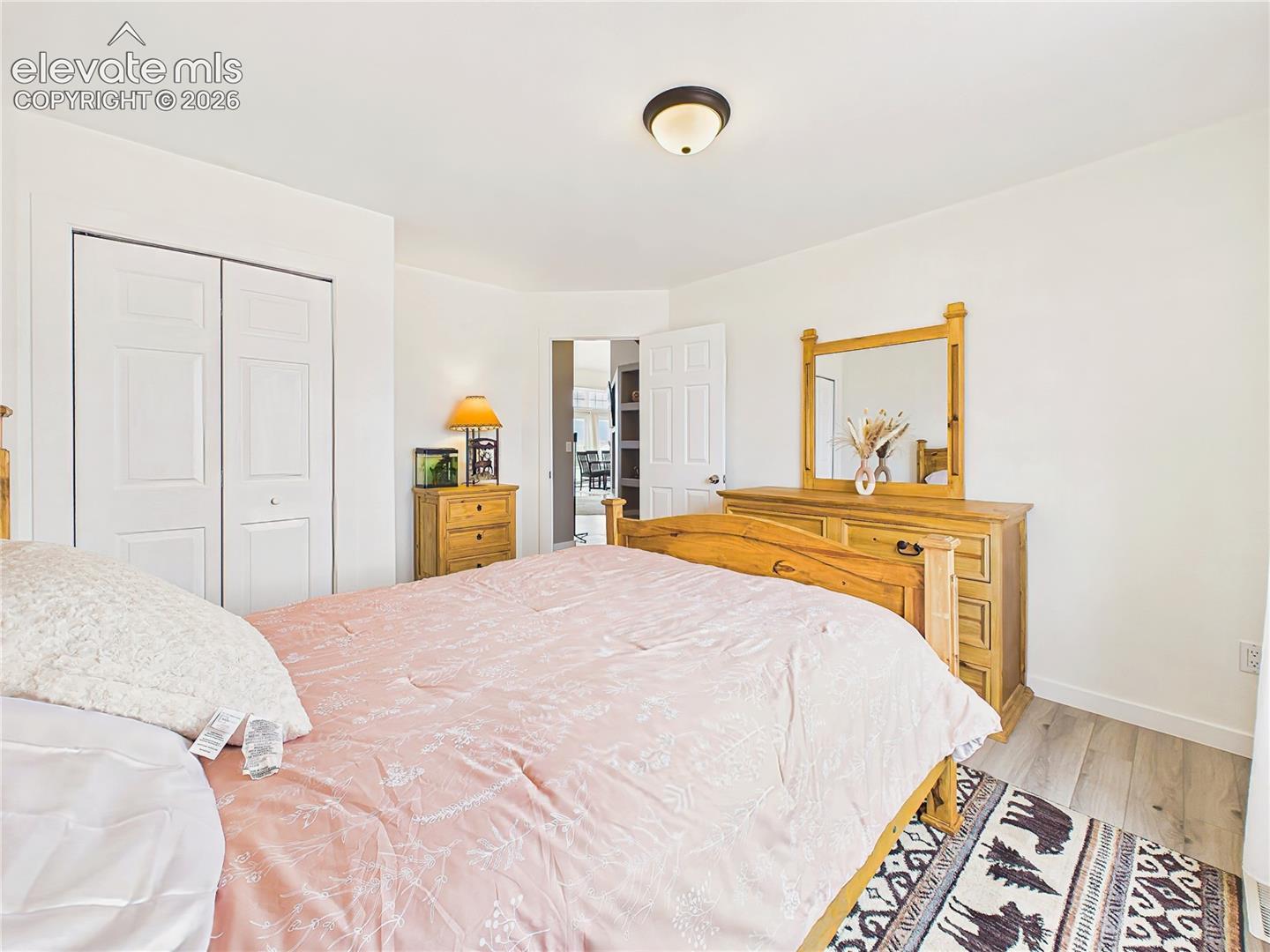 Bright bedroom 2 offers peaceful views of the surrounding property and flexible use for family or visitors.