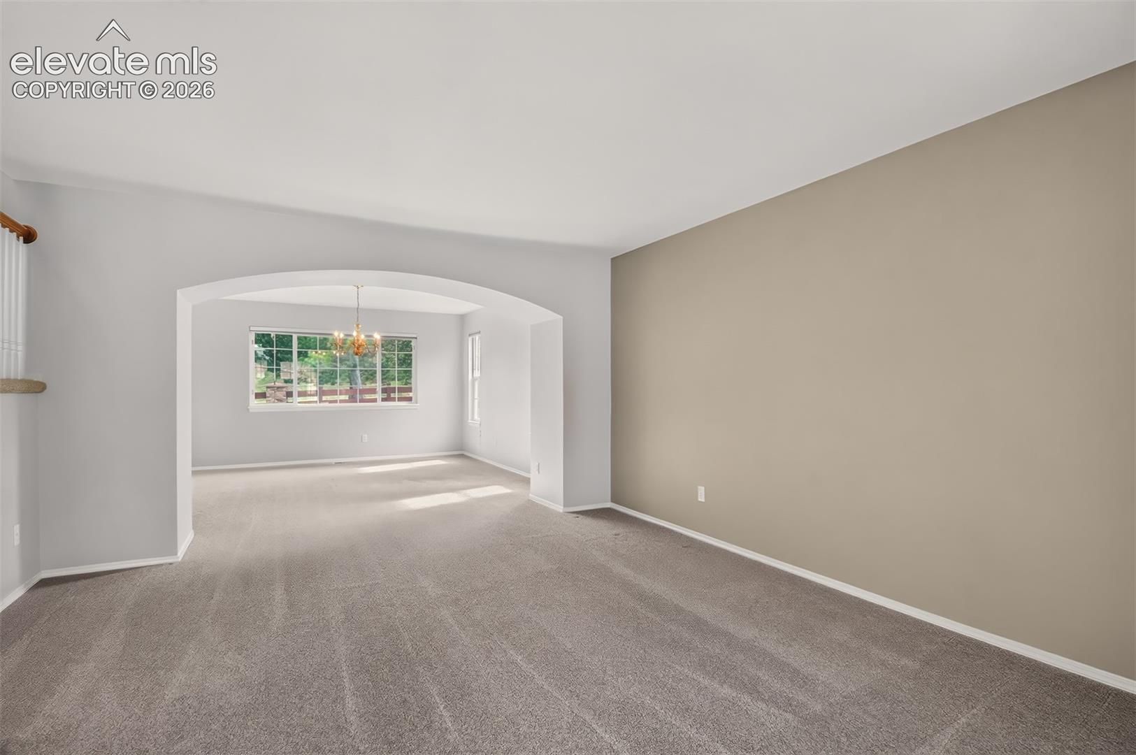 Living Room Looking Into The Dining Room, Newer Carpet and Interior Paint