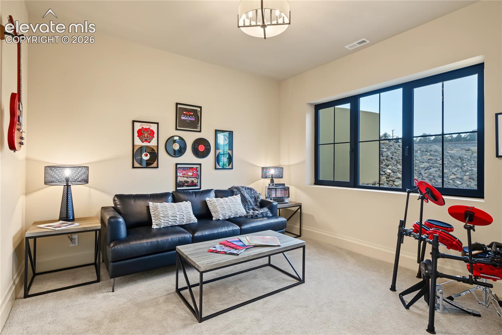 5th bedroom in the basement, being used as a music room