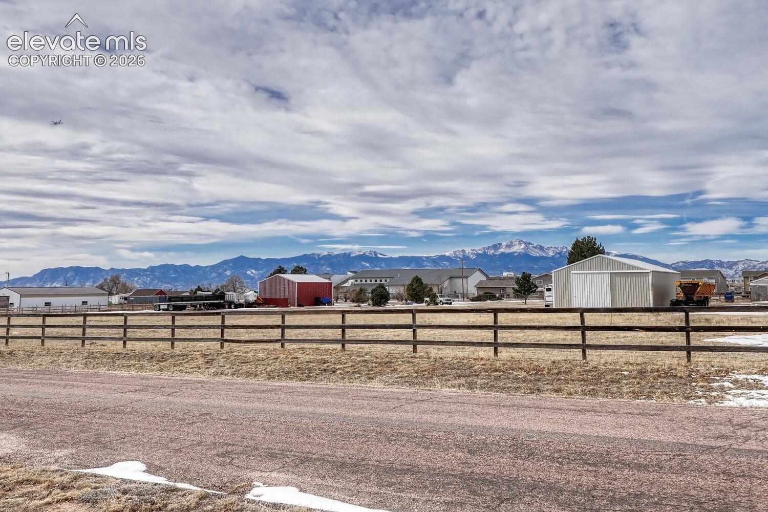 Front of the house with sweeping front range views and perfect Pikes Peak views!