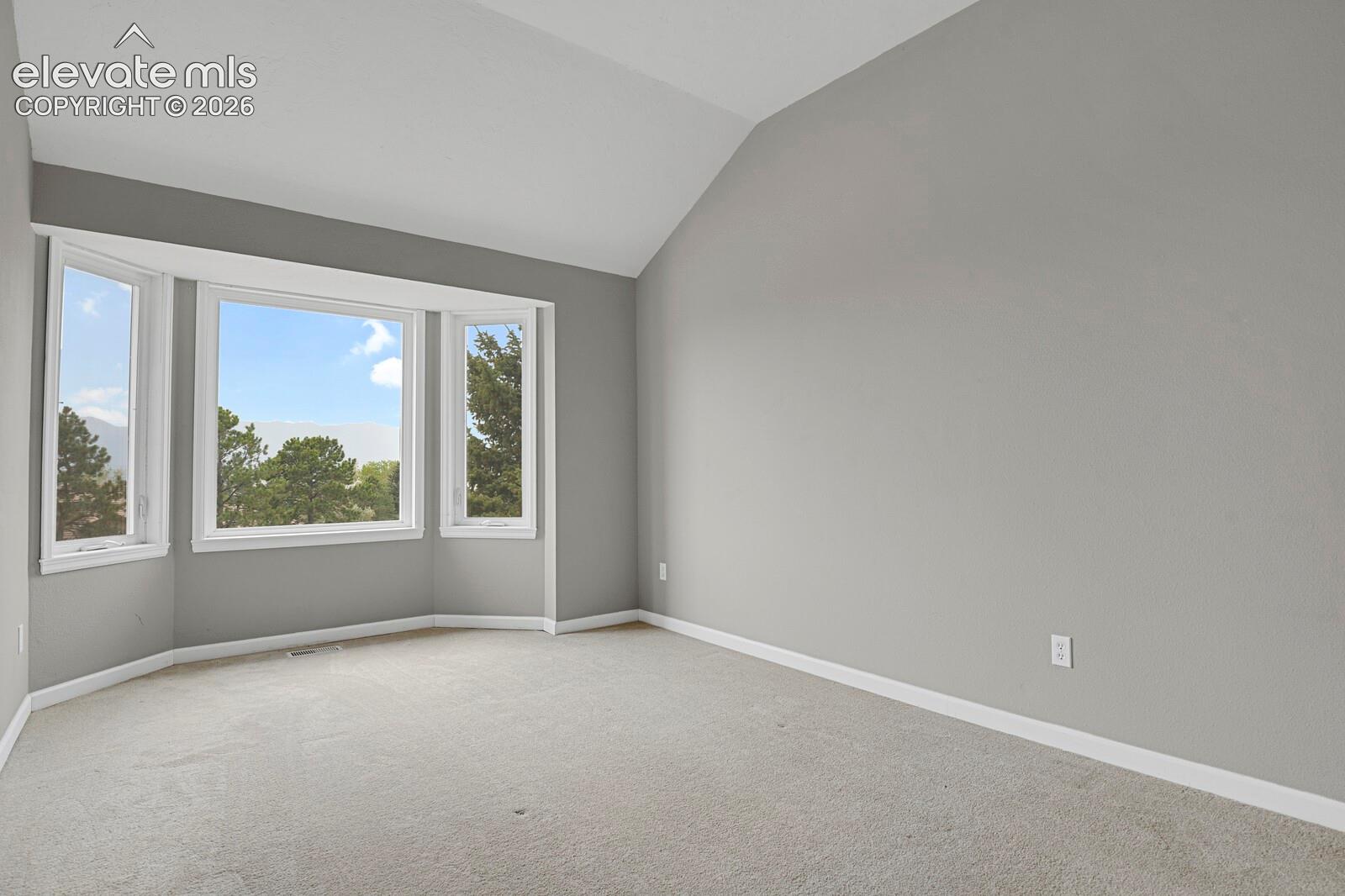 Sunny & bright with a vaulted ceiling