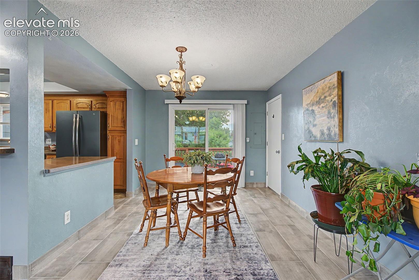 Dining Area with Backyard Views
